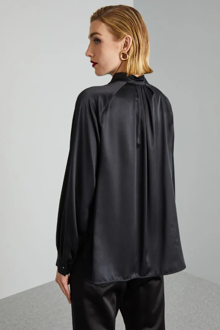 Blusa con laccetti