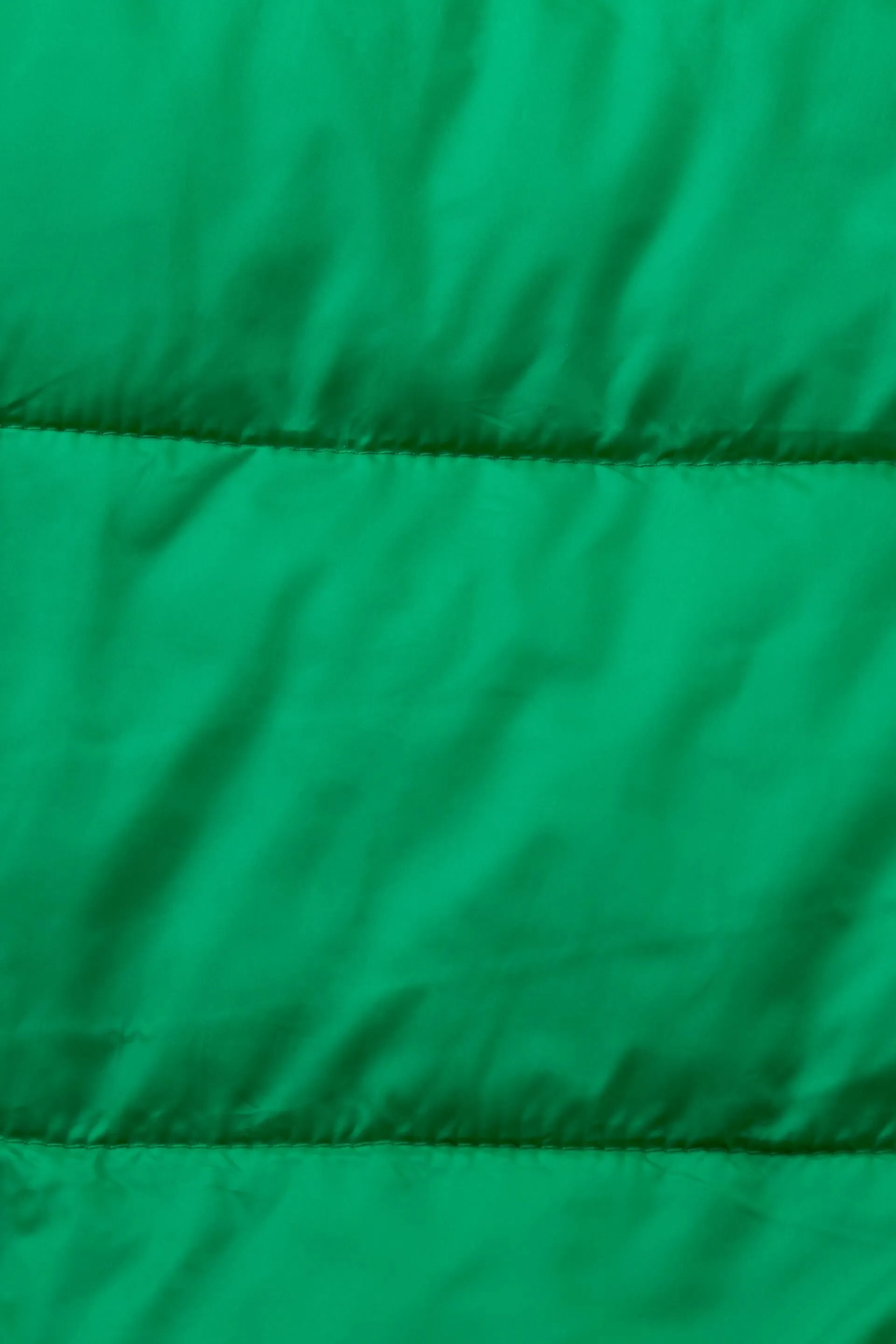 In materiale riciclato: gilet trapuntato