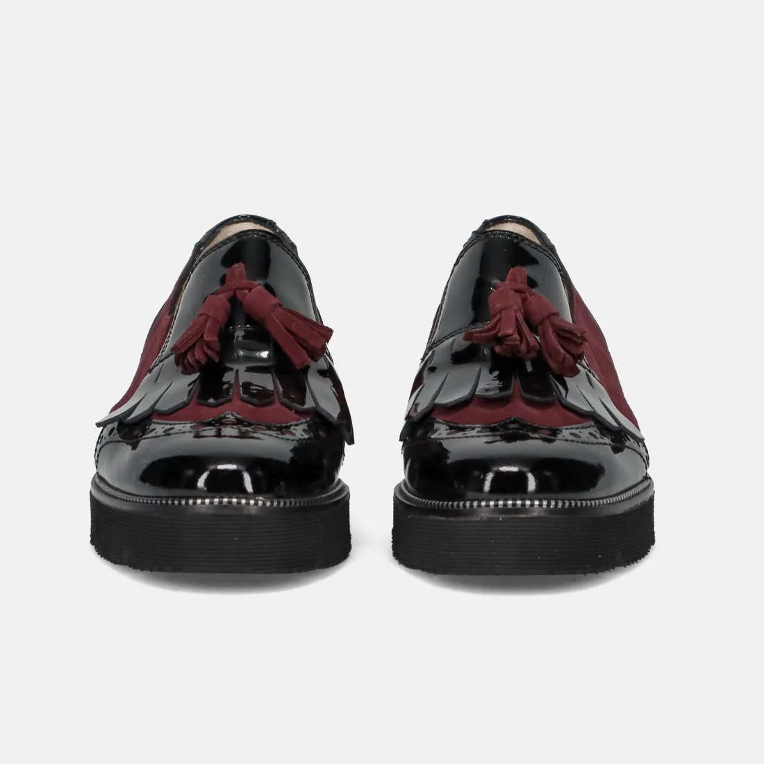 Scarpa slip on da donna Sangiorgio bordeaux e nera con frangia e nappine