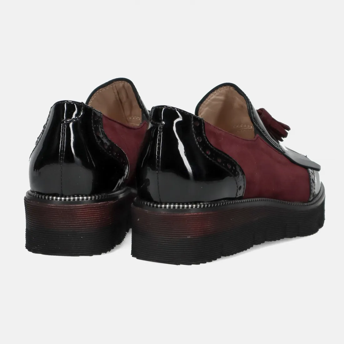 Scarpa slip on da donna Sangiorgio bordeaux e nera con frangia e nappine